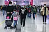 Une station de train à Hong-Kong : les mouvements du Nouvel-An chinois se font quand-même (Photo : AFP).