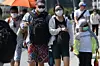 Sur le front de mer de Singapour, les touristes portent des masques aussi (Photo : AFP).