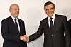 François Fillon (à droite) a salué dimanche soir Alain Juppé, finaliste perdant de cette primaire. (photo AFP)