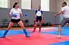 Jenny Warling, ici à l’entraînement avec Pola Giorgetti et l’entraîneur national Raphael Veras, est prête à monter sur le tapis, aujourd’hui.