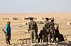 Des membres de la force arabo-kurde soutenue par les Etats-Unis, dimanche, à 50 km au nord de Raqa.