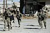 Des soldats américains patrouillent près d'une base militaire de l'armée itakienne près de Mossoul le 23 novembre 2016.