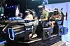 Le simulateur de réalité virtuelle attire les curieux tout au long du week-end, avec des files d’attente devant les installations.