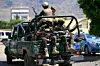 Les forces armées houthies du Yémen patrouillant, samedi 12 septembre, dans la capitale Sanaa.