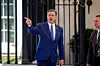 WASHINGTON, DC - JULY 13: CIA Director John Ratcliffe exits the West Wing at the conclusion of a Freedom 250 Grand Prix showcase on West Executive Avenue between the West Wing of the White House and the Eisenhower Executive Office Building on July 13, 2026 in Washington, DC. The IndyCar Freedom 250 Grand Prix car race, August 22 and 23 on the National Mall, is part of America's 250th anniversary celebrations. Andrew Harnik/Getty Images/AFP (Photo by Andrew Harnik / GETTY IMAGES NORTH AMERICA / Getty Images via AFP)