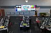 Des agents de régulation travaillent dans la salle de contrôle lors d'une visite au centre de coordination de la brigade des sapeurs-pompiers de Londres.
