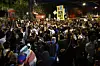 Des manifestants et des forces de l'ordre se sont affrontés à proximité du lieu où un homme a été abattu par un agent de l'ICE.